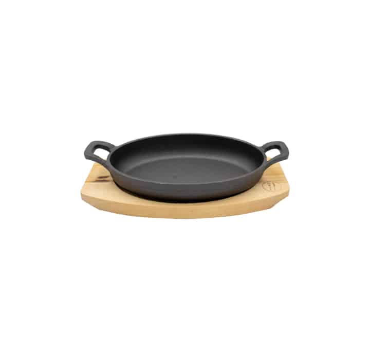 Regent Cast Iron Oval Pan on Birch Wood Board